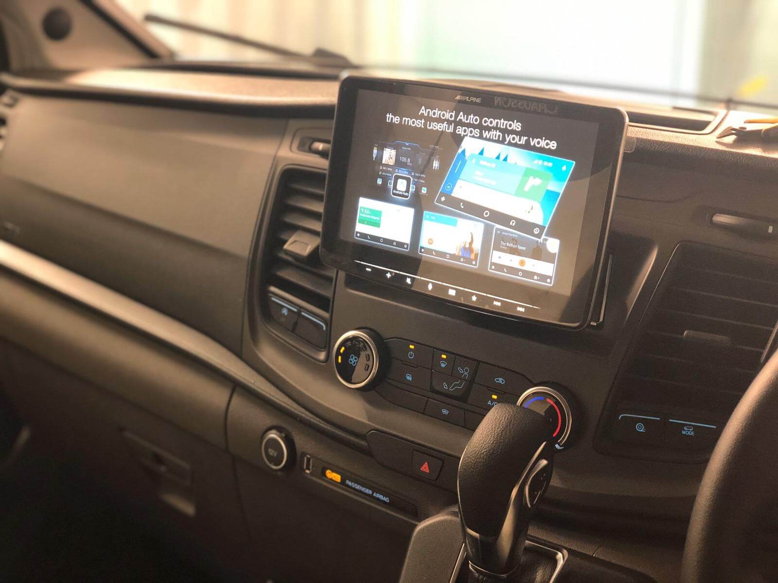 Alpine Halo 9" touchscreen radio upgrade in Ford Transit Motorhome