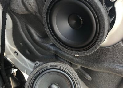 Mini Speaker upgrade installed showing OEM speaker
