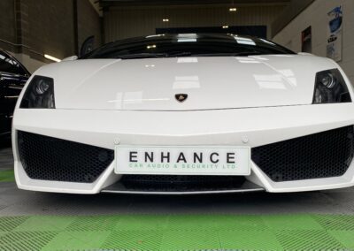 Front of Lamborghini in Enhance Workshop